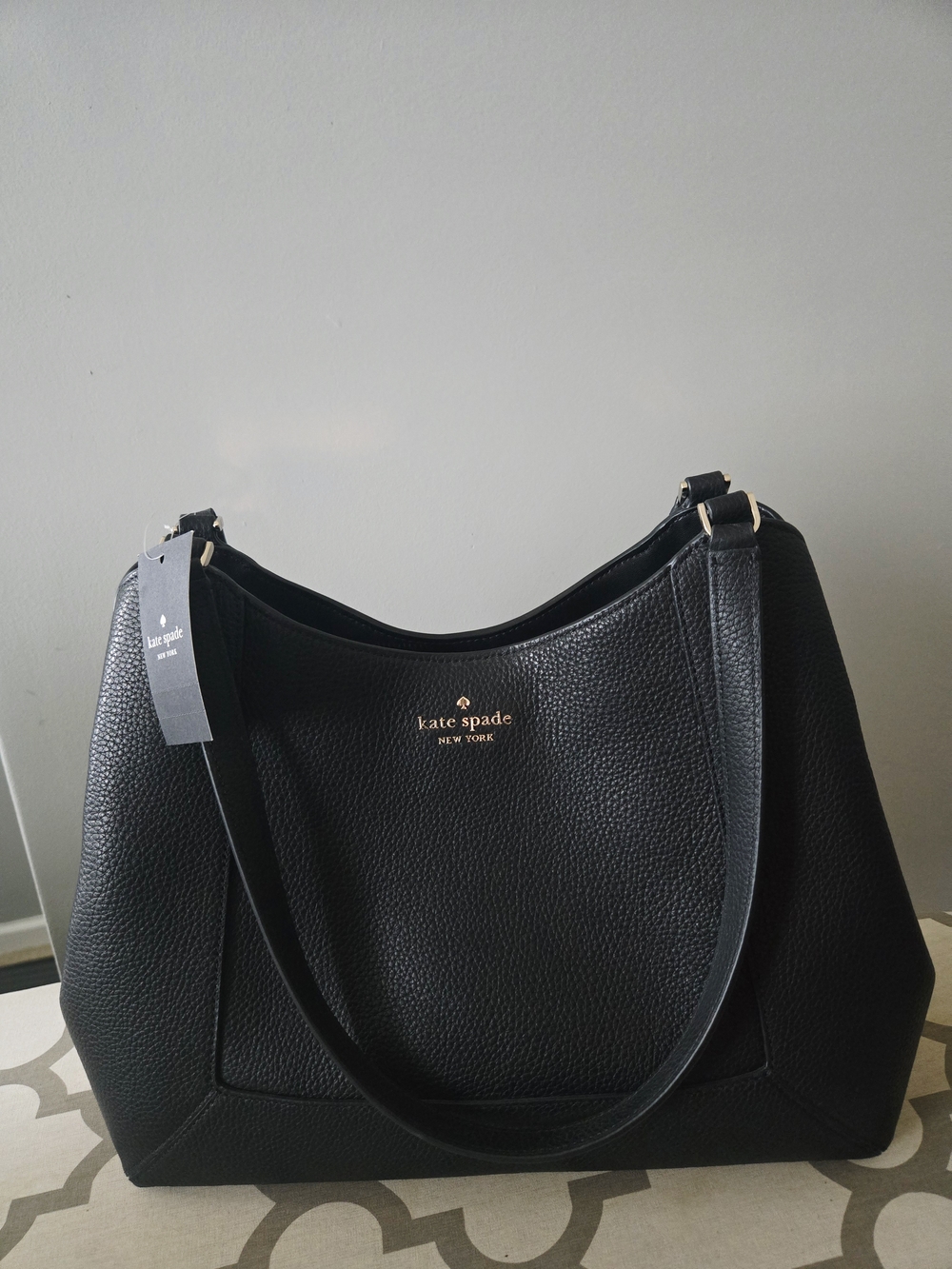 kate spade black pebbled leather shoulder bag with gold logo